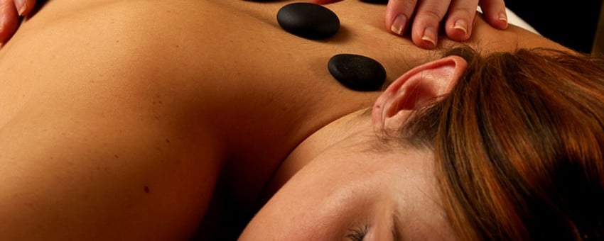 Stone therapy or hot stone massage
